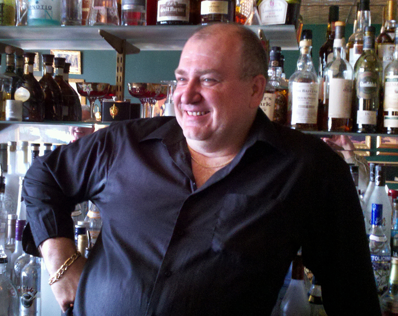 The late Tom Kopunek loved sharing his collection of fine spirits at Red Square. BY BOB YESBEK